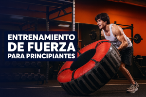 Persona levantando neumático en gimnasio durante entrenamiento de fuerza para principiantes
